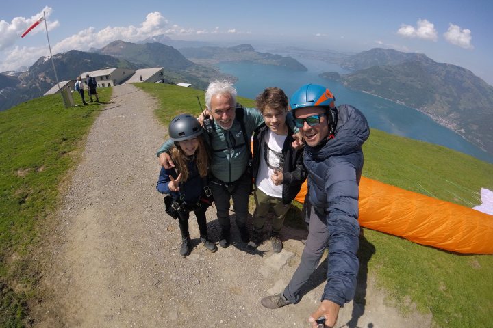 happy family paragliding